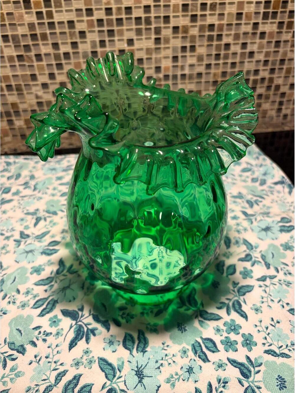 This is a vintage emerald green coin dot art glass vase by Fenton.
